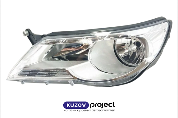 Фара левая с электрическим корректором Volkswagen Tiguan 2006-2011 (TYC / Тайвань)